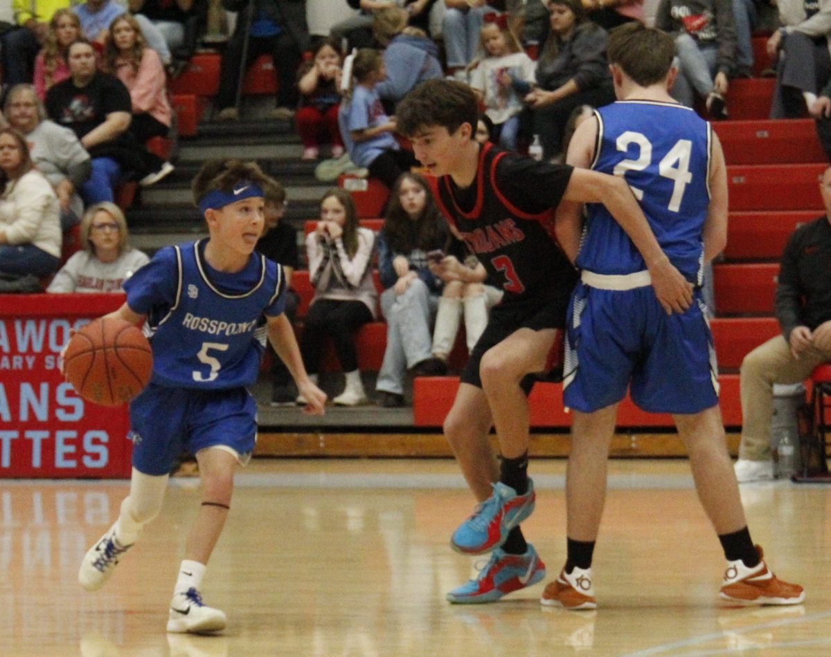 Rosspoint guard Weston Nolan worked against the James A. Cawood defense in middle school basketball action Thursday.