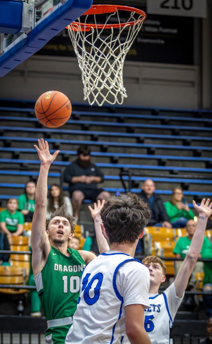 Harlan senior guard Dylan Cox scored 14 points in the Green Dragons' 55-54 overtime loss to Newport in the Kentucky All "A" Classic quarterfinals on Friday.