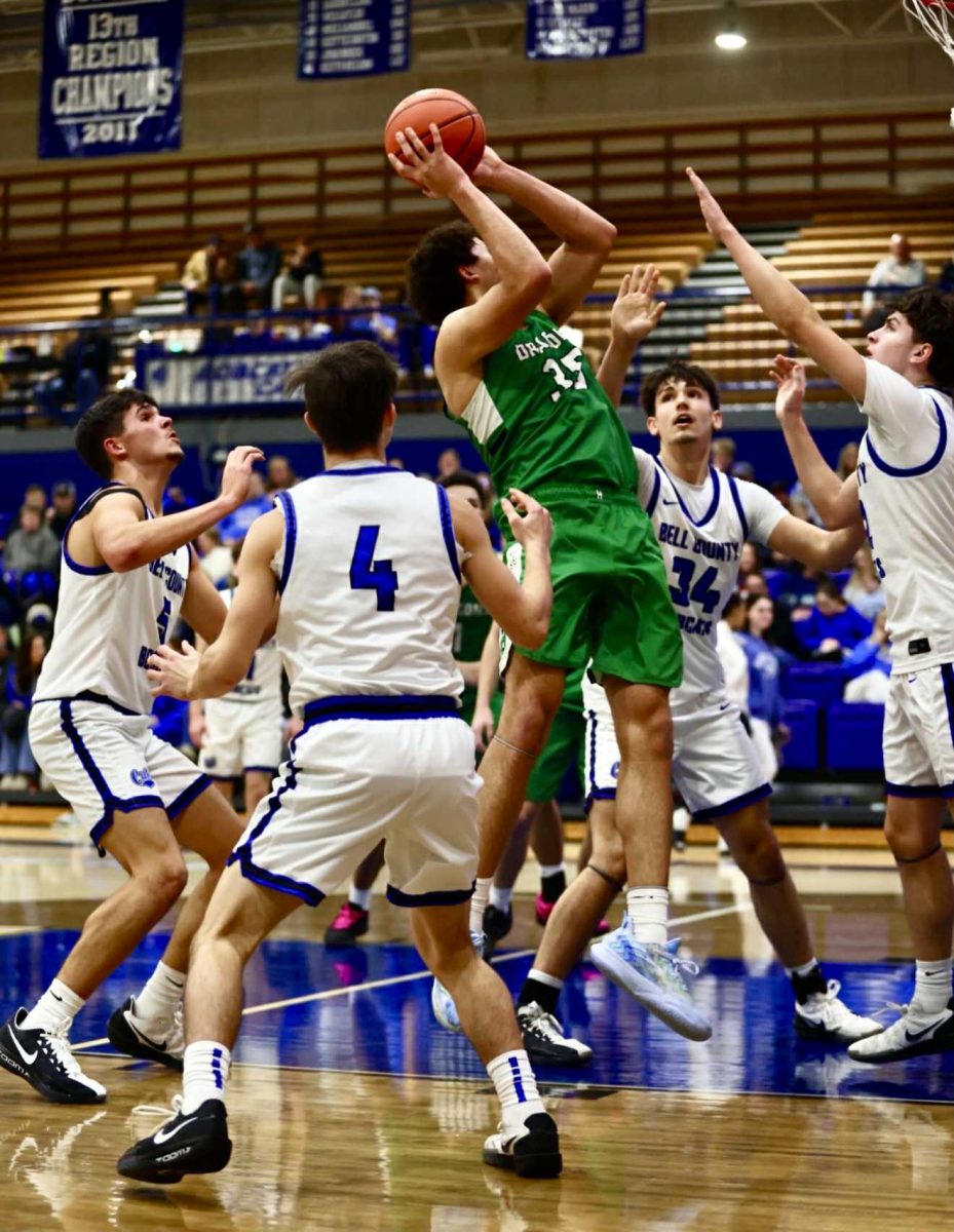 Harlan sophomore center Kobe Noe went up for a shot in action earlier this season. Noe had 16 points and 13 rebounds Monday as the Green Dragons overpowered Barbourville 56-29 in the 13th Region All "A" Classic semifinals.