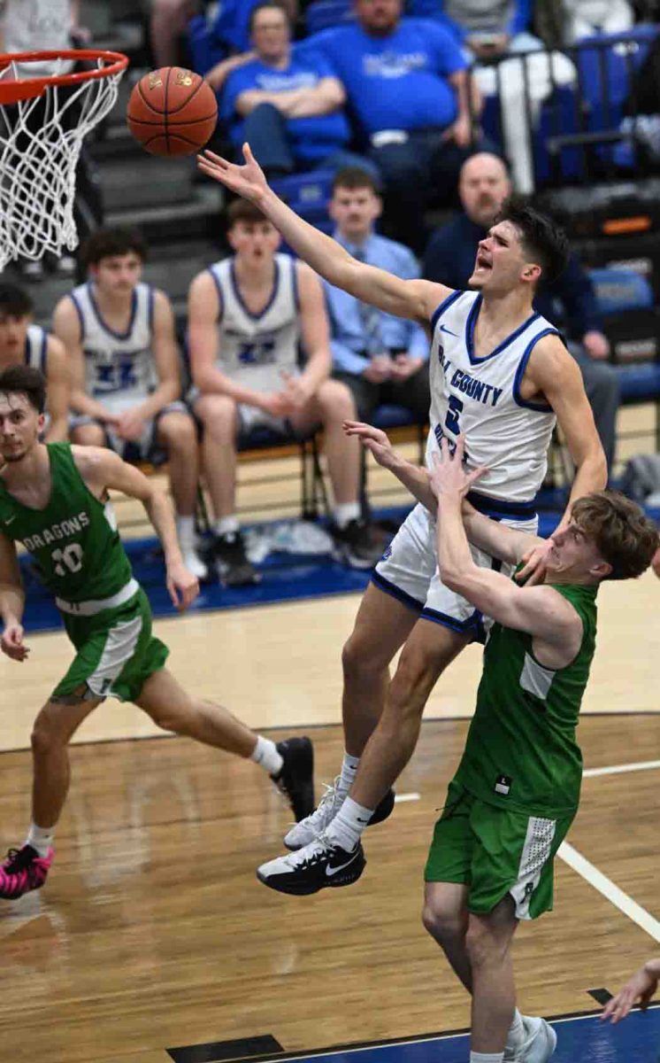 Bell County senior guard Blake Burnett drew a foul as he went up for a shot in Friday's 52nd District Tournament finals. Burnett scored 18 points in Bell's 72-40 win.