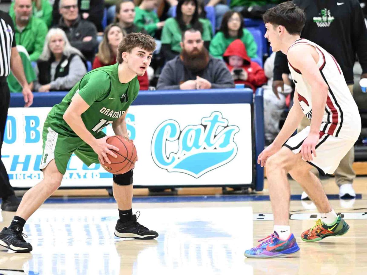 Harlan guard Ethan Huff scored 20 points Tuesday in the Green Dragons' 55-51 win over Harlan County in the 52nd District Tournament.
