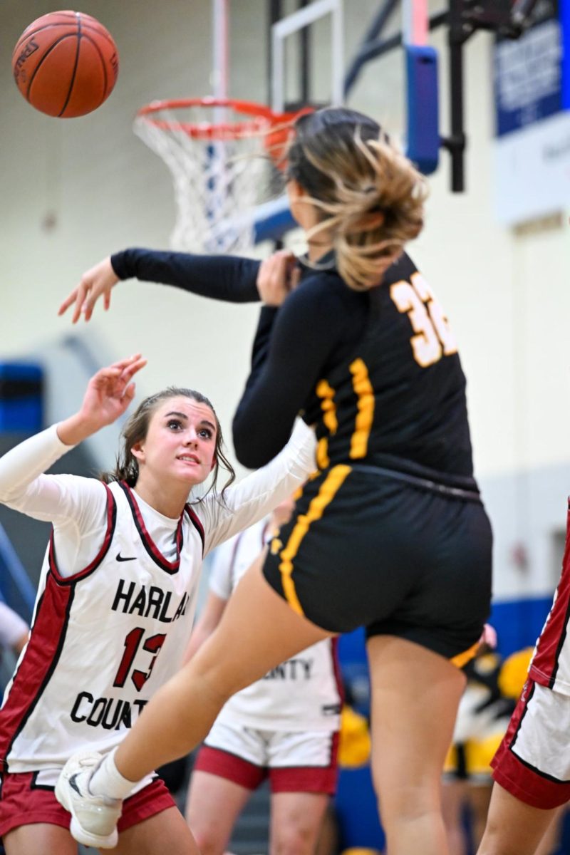 DV - Middlesboro's Emily Lambert passes over Jaylee Cochran