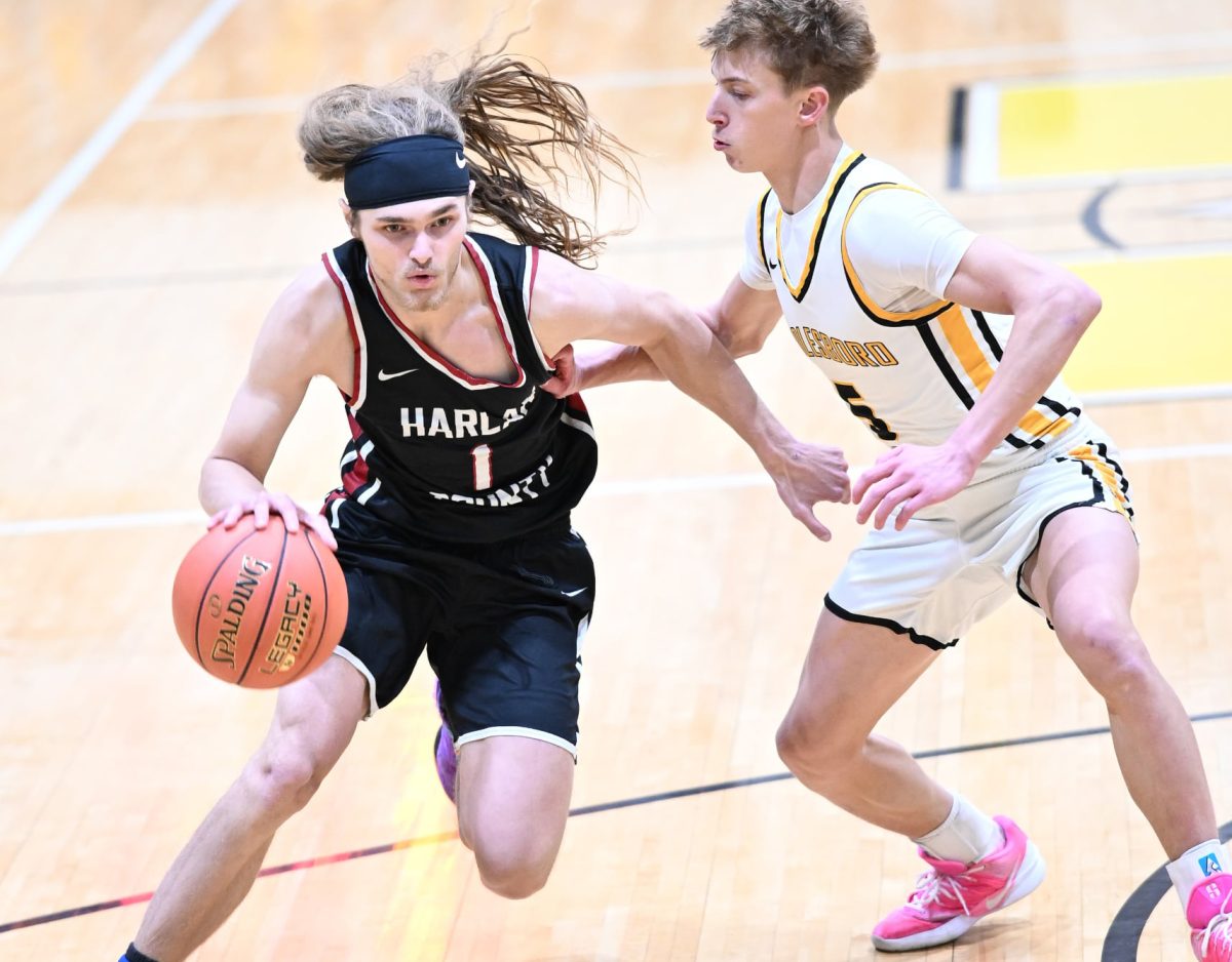 Harlan County senior guard Reggie Cottrell scored 24 points to lead the Bears in a hard-fought 54-47 loss Tuesday at Bell County.