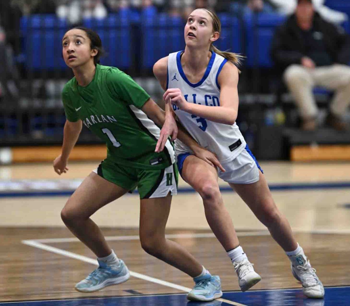 Harlan's Torrie Sunday and Bell County's Bristal Jordan battled for a rebound in action from the 52nd District Tournament on Monday. Bell County advanced with a 59-35 victory.