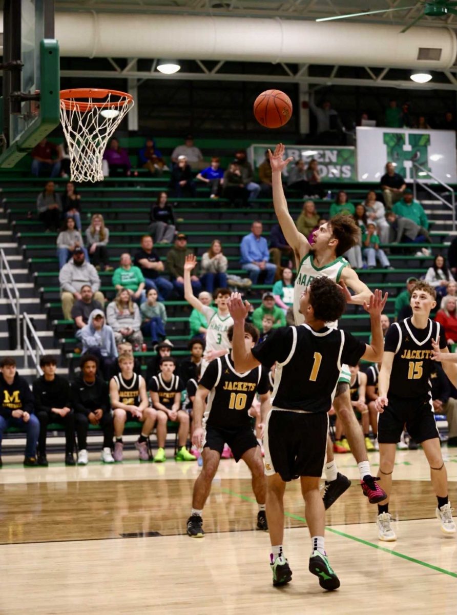 
Harlan senior guard Dylan Cox went to the basket for two of his nine points in the Dragons' 75-64 win over Middlesboro.
