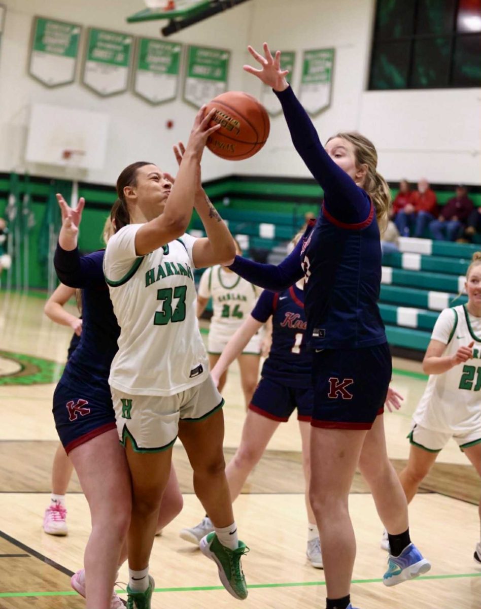 Harlan's Raegan Goodman worked inside Thursday against Knott Central center Samari Bailey. The visiting Lady Patriots won 61-41 as Bailey scored 12 points and grabbed 10 rebounds.