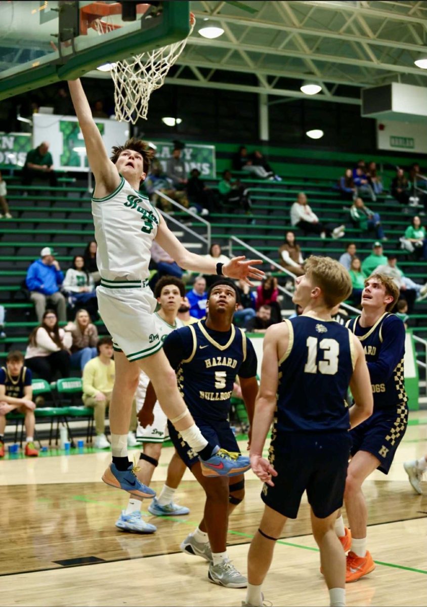 Harlan sophomore guard Izack Saylor went to the basket for two of his nine points in the Dragons' loss to Hazard on Wednesday.