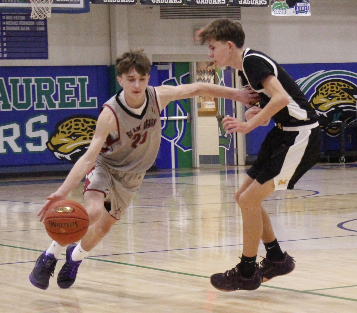 Harlan County guard Easton Engle drove around a Middlesboro defender in the 13th Region Freshman Tournament. Engle scored nine in the Bears' 39-36 win.