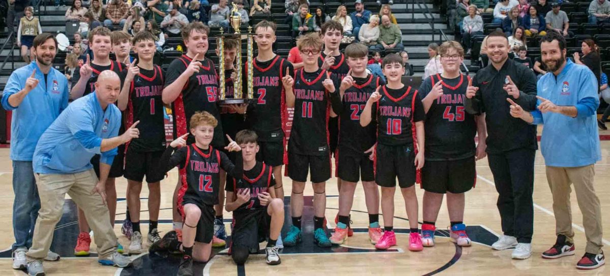 The James A. Cawood Trojans completed a 17-0 mark against county competition with a win over Evarts in the seventh- and eighth-grade county tournament Monday at Harlan County High School.