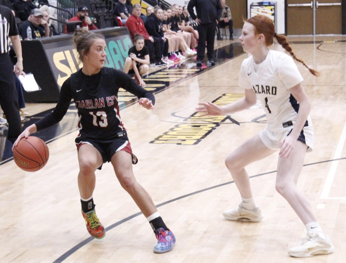 Harlan County guard Jaylee Cochran worked against Hazard's Emily Higgins during action from the Donnie Gray Shootout at Clay County.  Cochran scored 11 points in the Lady Bears' 50-41 victory.