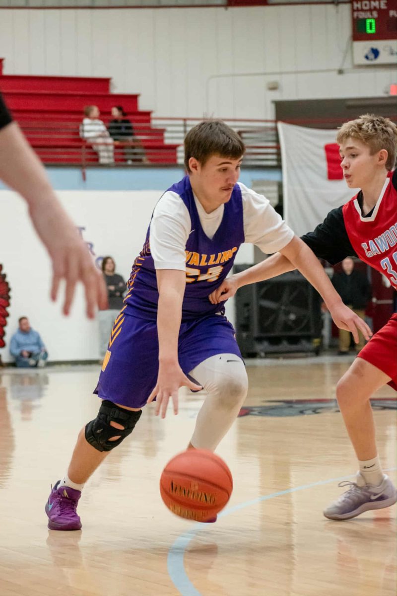 Wallins' Landin Blackwelder drove to the basket during the Purple Devils' 49-23 win Tuesday the opening round of the seventh- and eighth-grade county tournament.
