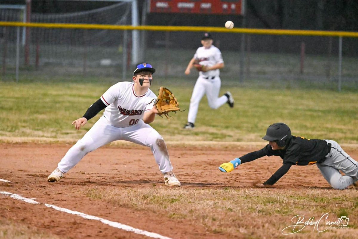 Harlan County's Carter Caldwell took a throw at third base during recent middle school action. Caldwell led the Bears with three hits in a win Monday at Bell County.