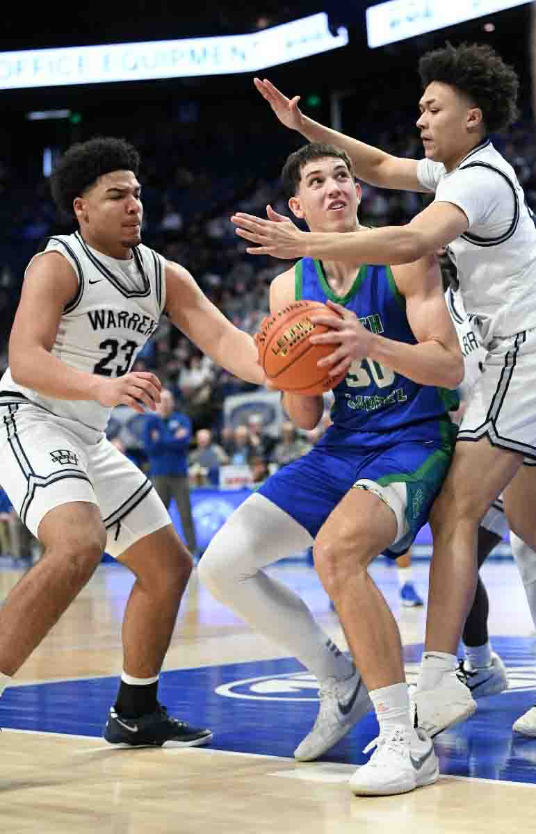 North Laurel's Reece Davidson worked inside for two of his 20 points in the Jaguars' 52-38 win over Warren Central in the state tournament.