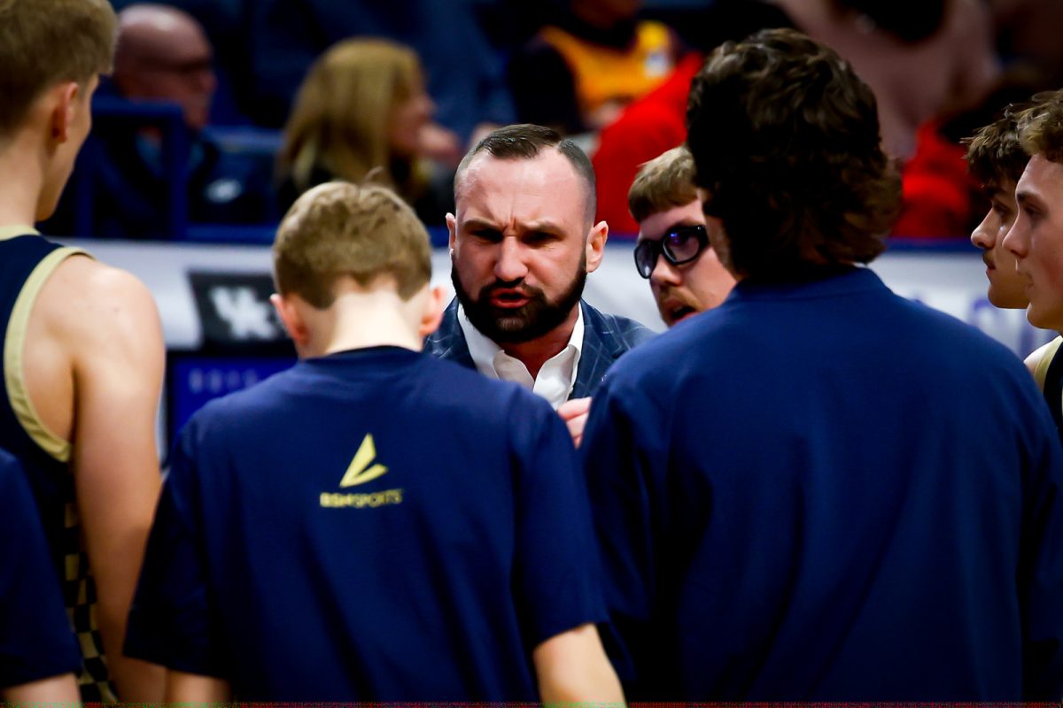 Hazard coach Casey Huff stressed a point during a timeout Thursday in action from the state tournament.