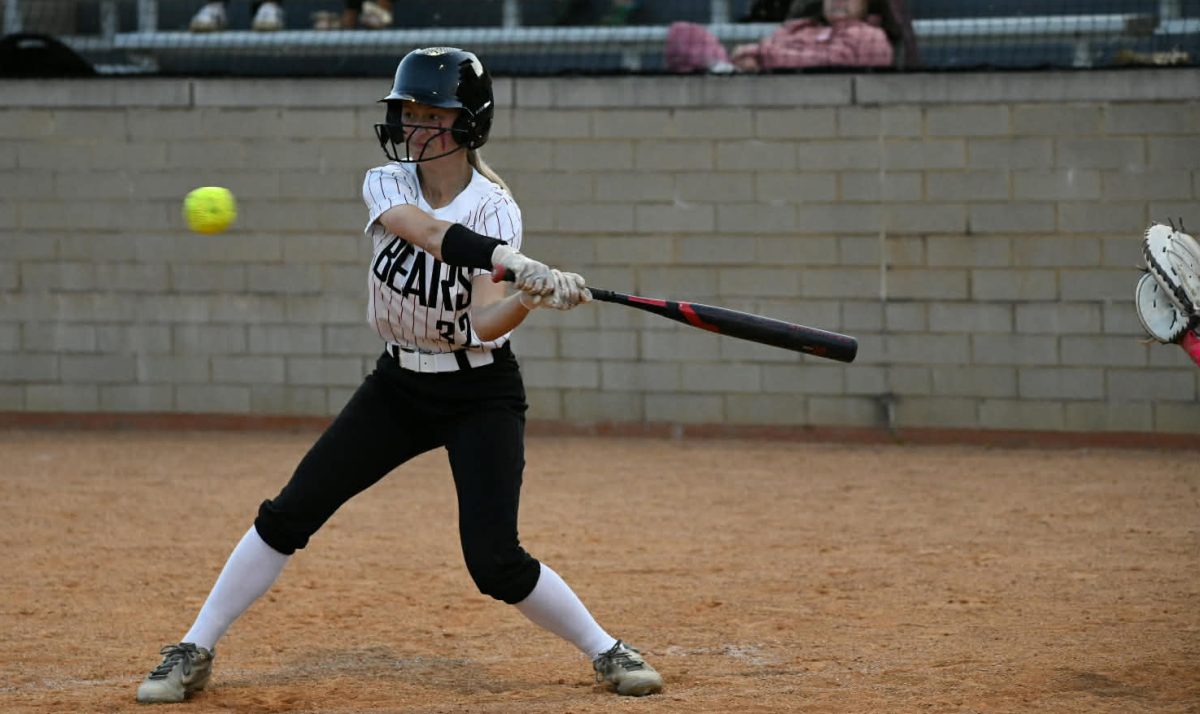 Harlan County outfielder Aly Sherman went after a pitch in Tuesday's game against Leslie County.
