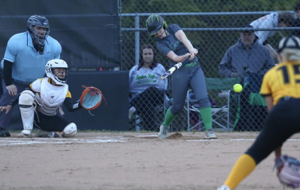 Harlan freshman second baseman Daria Lee connected on one of her two hits Monday in the Lady Dragons' 13-8 loss to Middlesboro.