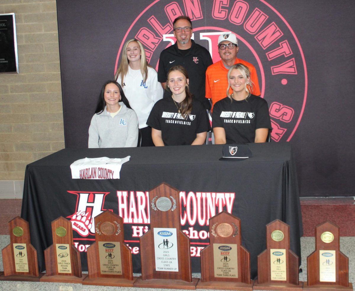 Harlan County High School seniors Suzy Mumford, Maddi Middleton and Addy Caldwell signed on Wednesday to continue their track careers on the collegiate level.