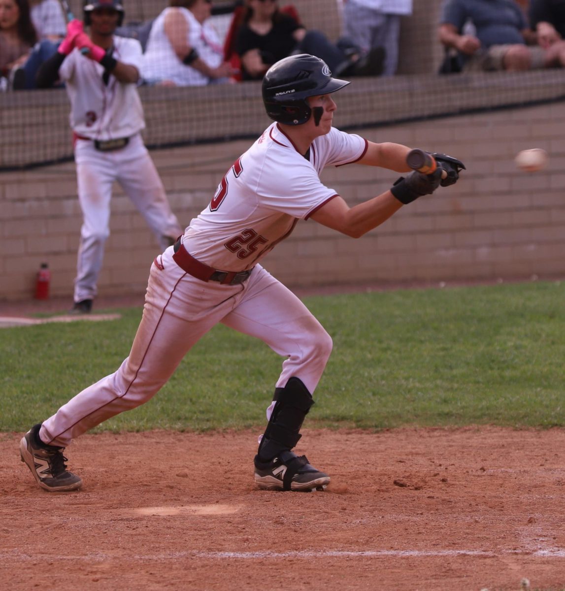 Harlan County outfielder Brayden Morris laid down a sacrifice bunt Thursday to set up a run in the Black Bears’ 7-6 win over visiting Rye Cove, Va.