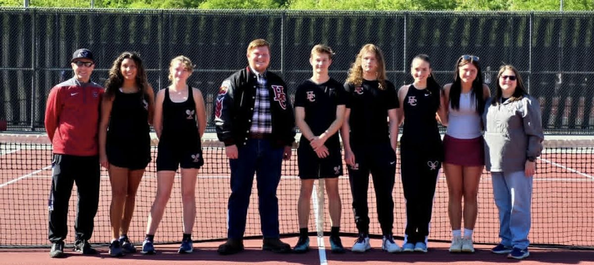 The Harlan County High School tennis seniors were honored before Thursday’s match against Letcher Central. Pictured, from left, are coach Caleb Bailey, Alley Stewart, Riley Witt, Ethan Peterson, Elijah Moore, Josh Stewart, Sophie Day, Kalista Dunn and assistant coach Erica Moore.

