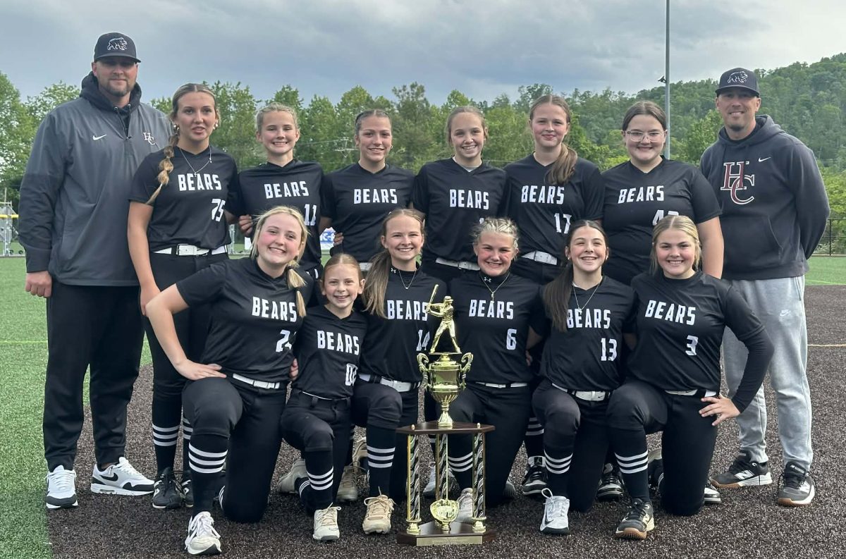 Harlan County repeated as champions of the Kentucky Middle School Fast Pitch Conference by defeating Lynn Camp, Bell County and Harlan in tournament action over the weekend. Team members include, from left, front row: Riley Owens, Maddy Barrett, Aniston Burton, Bella, Ford, Campbell Thompson and Cayleeann Yount; back row: coach Andrew Burton, Lexi Boggs, Andrea Napier, Khloe Daniels, Zoey Reed, Embrey Engle, Kialia Phillips and coach Drew Chamberlain; not pictured: Chloe Perkins, Sadie Huckleby and Ella Brock.