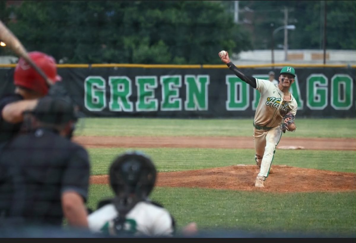 Harlan's Baylor Varner pitched a one-hitter with 18 strikeouts Monday as the Green Dragons advanced to the 52nd District Tournament finals with a 7-0 win over Harlan County.
