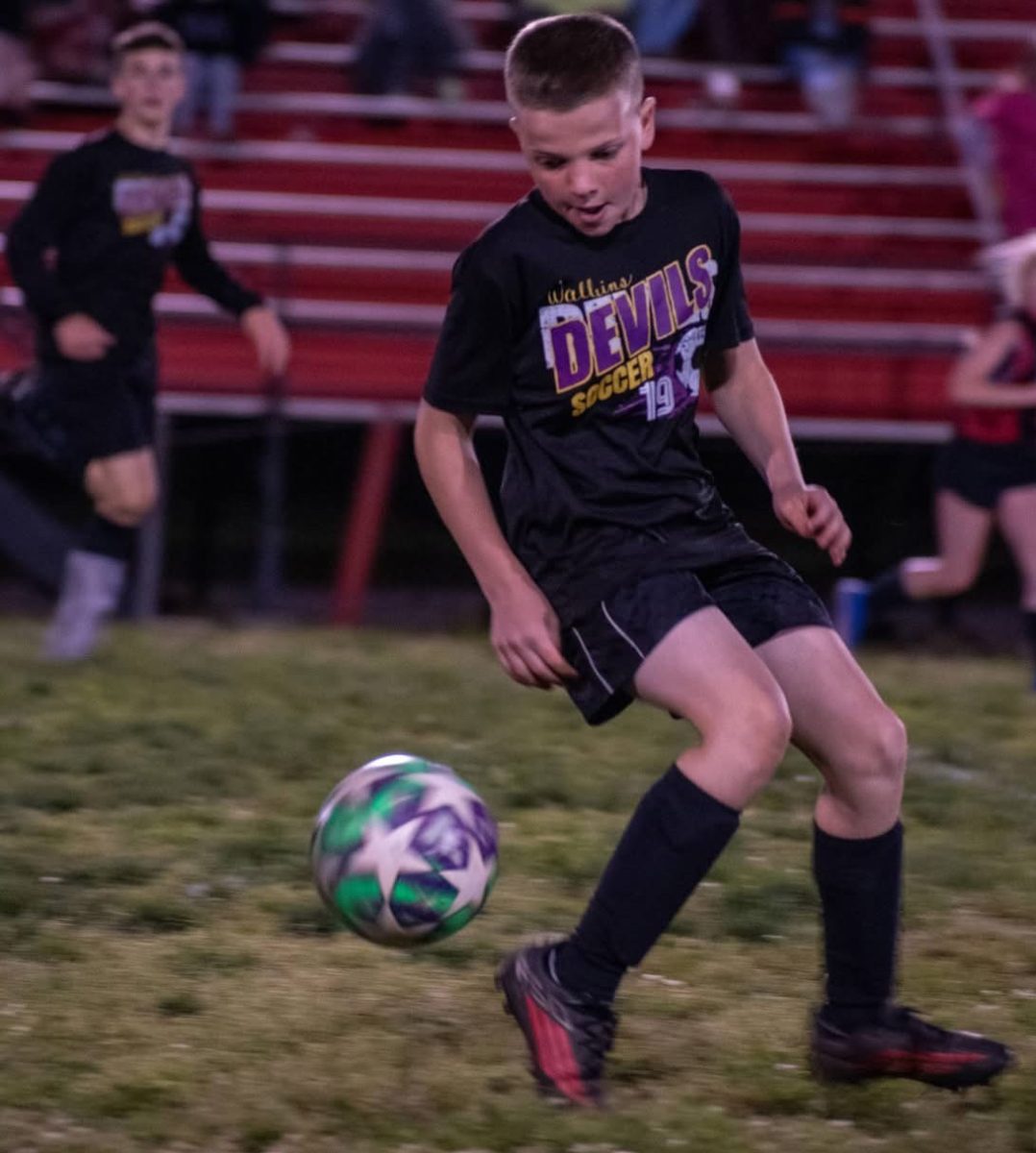 Jace Sargent fields a ball earlier this season for the Wallins Purple Devils. Sargent was one of the experienced players returning this season for the Devils.