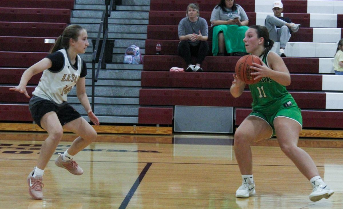 Harlan junior guard Addison Campbell worked the ball down court in summer scrimmage action Monday at Leslie County. Campbell led the Lady Dragons in both scrimmage as they fell to Leslie County and Owsley County.