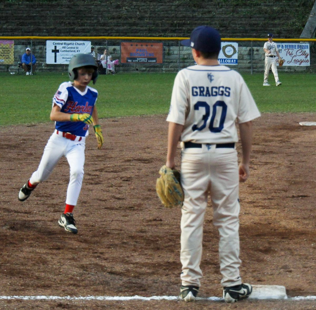 Harlan All Star Isaac Combs raced around third base on his way to scoring a run in the second inning on a double by Waylon Taylor in the District 4 Tournament. Harlan advanced with an 8-2 win over Knox County.