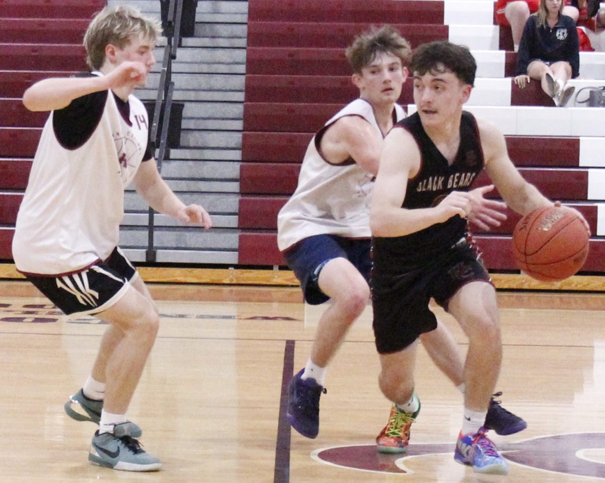 Harlan County guard Kaden Jones worked against pressure in summer basketball action earlier this month. The Black Bears won two games Thursday at Lindsey Wilson.