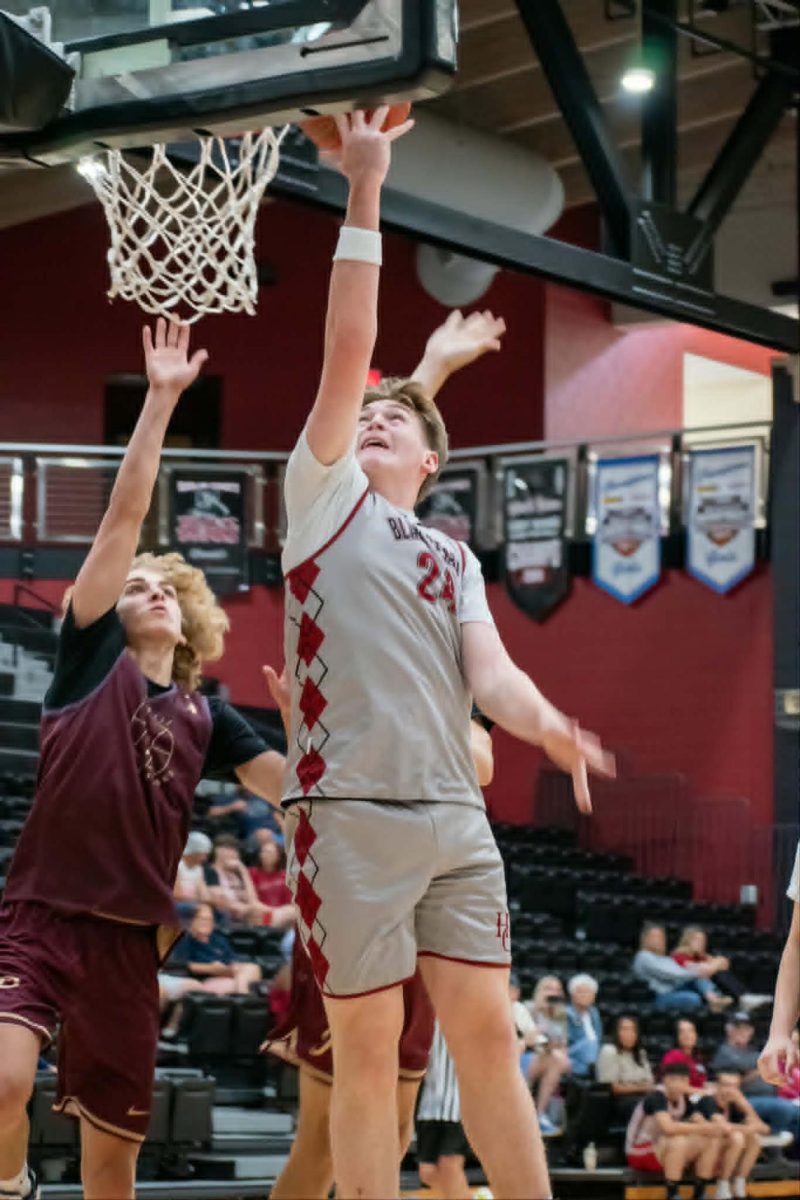 Harlan County junior forward Colton Delaney worked inside for a shot during the Bears’ 77-41 win Tuesday over visiting Pineville in summer basketball action.