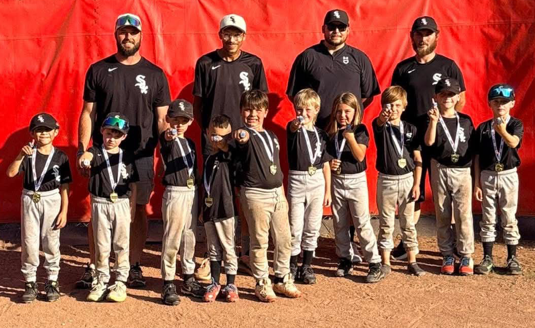 The White Sox won the minor league championship this season in the Tri City Little League, compiling an 18-0 record capped by a 10-0 victory over the Reds in the league championship game. Team members include, from left, front row: Francisco Perez, Ander Kramm, Kinnon Cornett, Kylan Cornett, Adrien Hensley, Parker Burton, Harper Quigley, Zaden Parrott, Daniel Brown and Jace Kramm; back row: assistant coach Jalen Kramm, coach Hunter Holland, and assistant coaches Dylan Cornett and Matthew Hensley.
