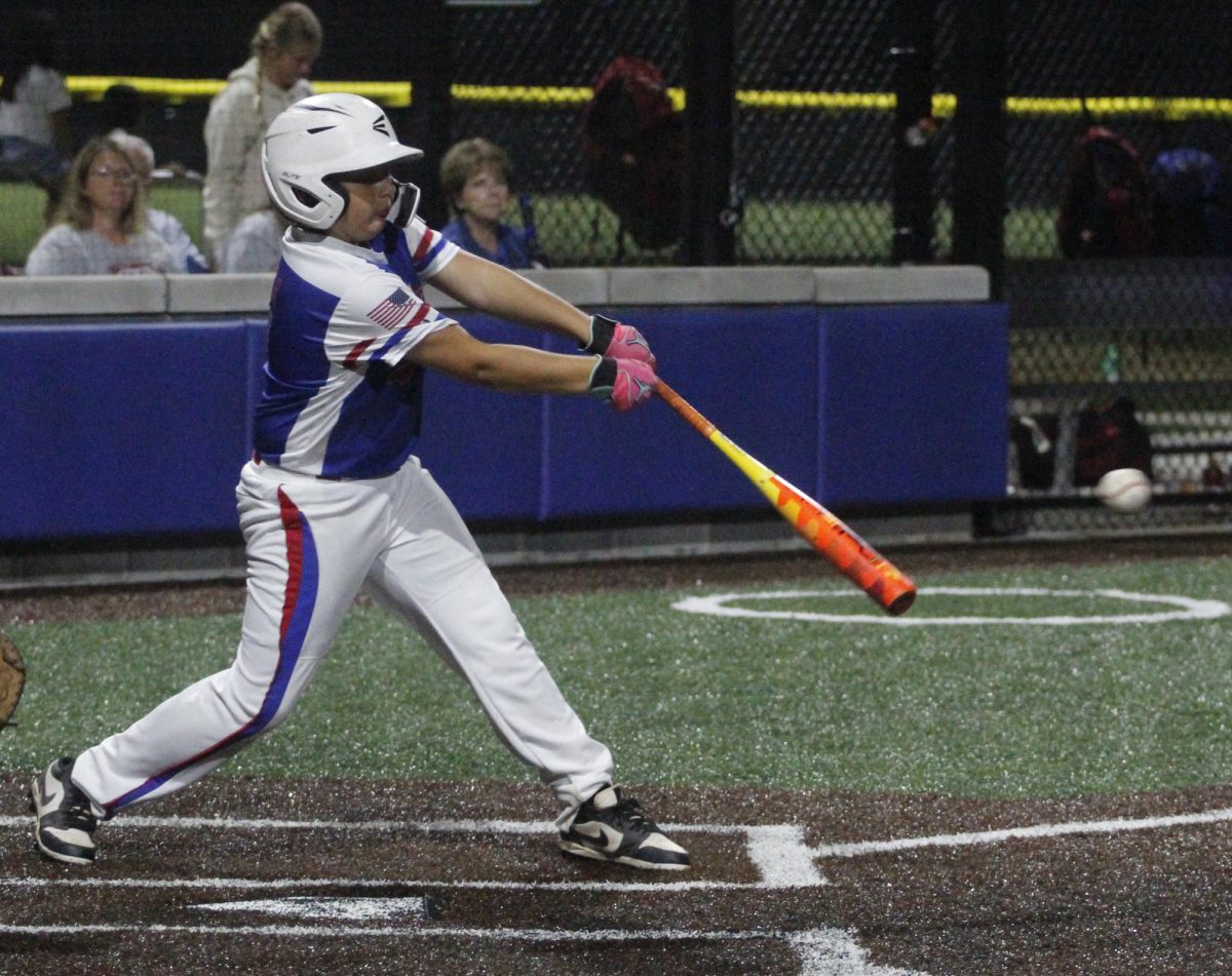 Harlan All Stars third baseman Maddox Landa went after a pitch in District 4 Tournament action Tuesday in Barbourville.